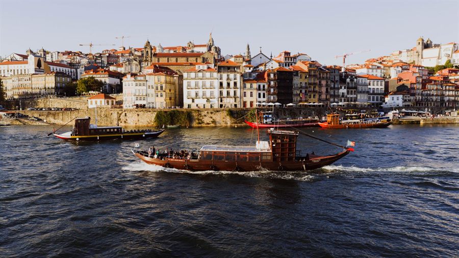 Traditional boats on the Douro River below the old town of Porto